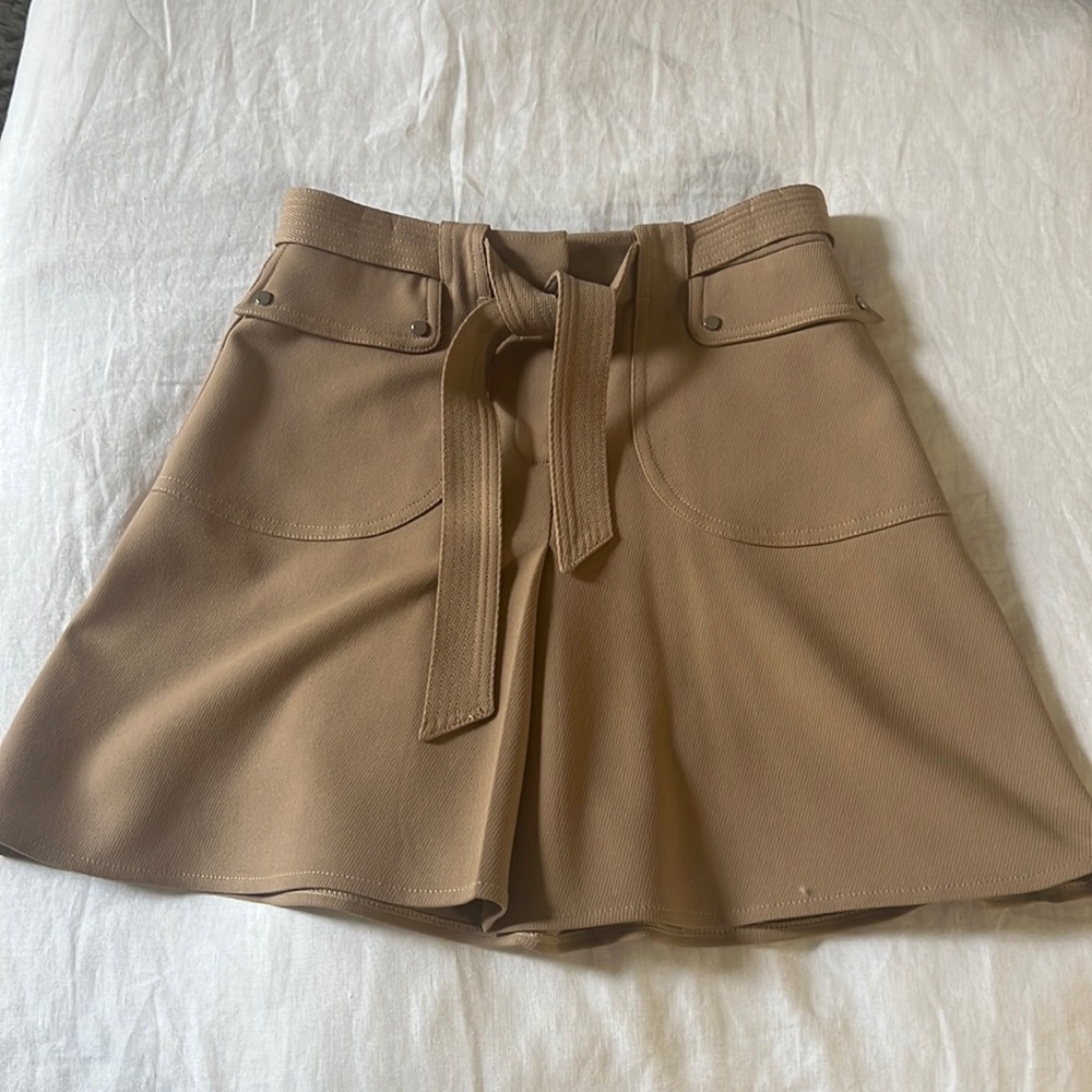 Maje tan mini skirt with adjustable belt and silver detailing size 2